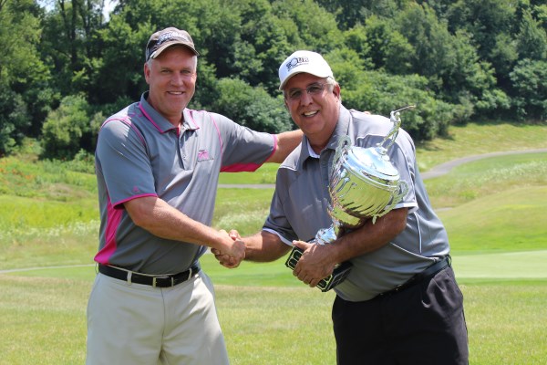 Dan presents cup to Mark